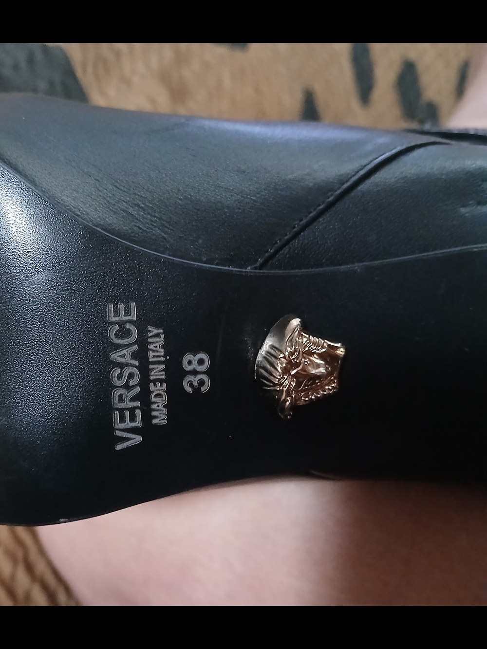 Versace Black Leather Ankle Boot with Gold Medusa Accent